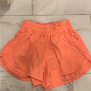 Lulu tracker short V 4” in Sunset, size 4